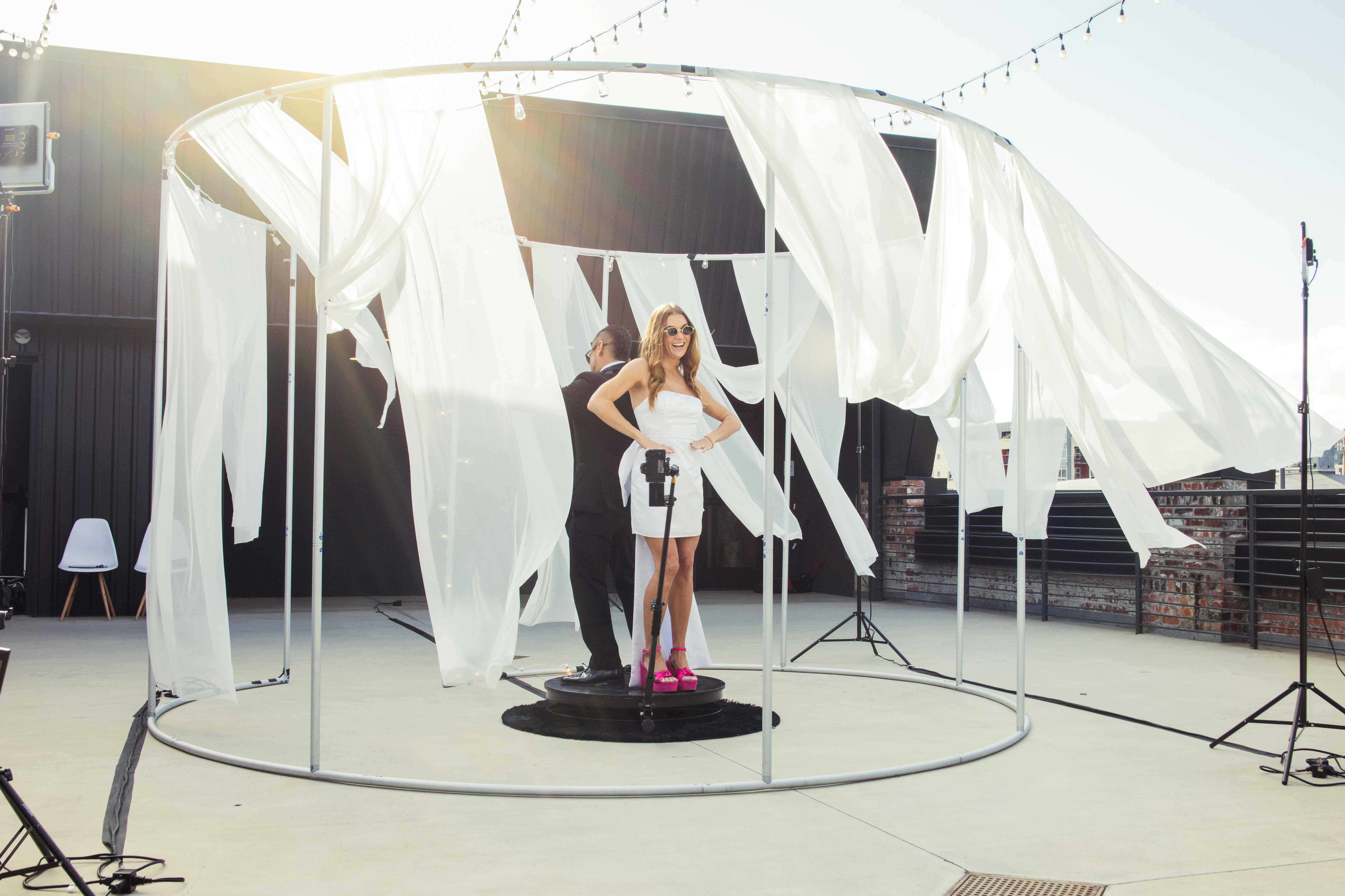 360 photo booth capturing slow-motion video at event