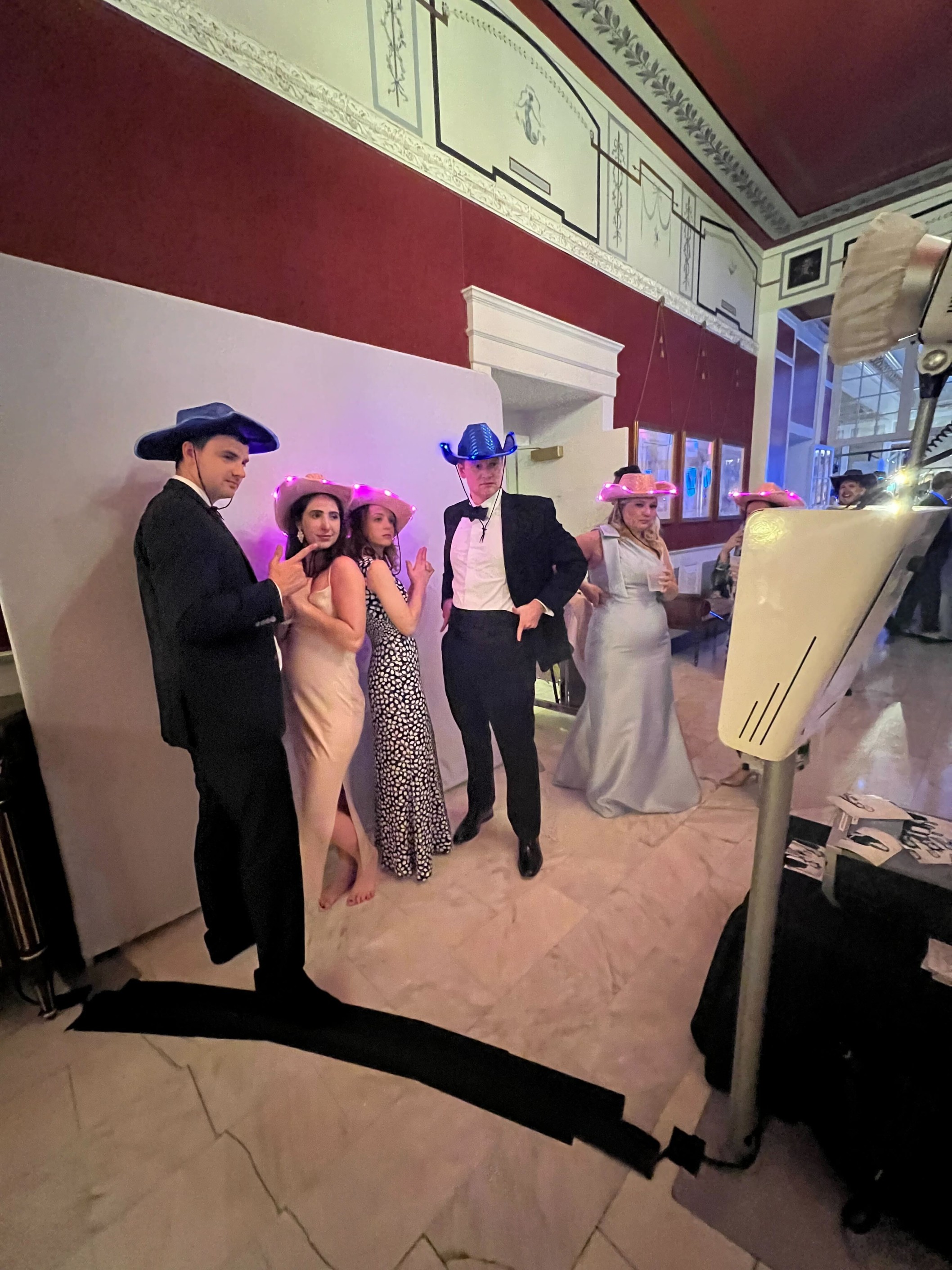 A group of people hitting cowboy poses