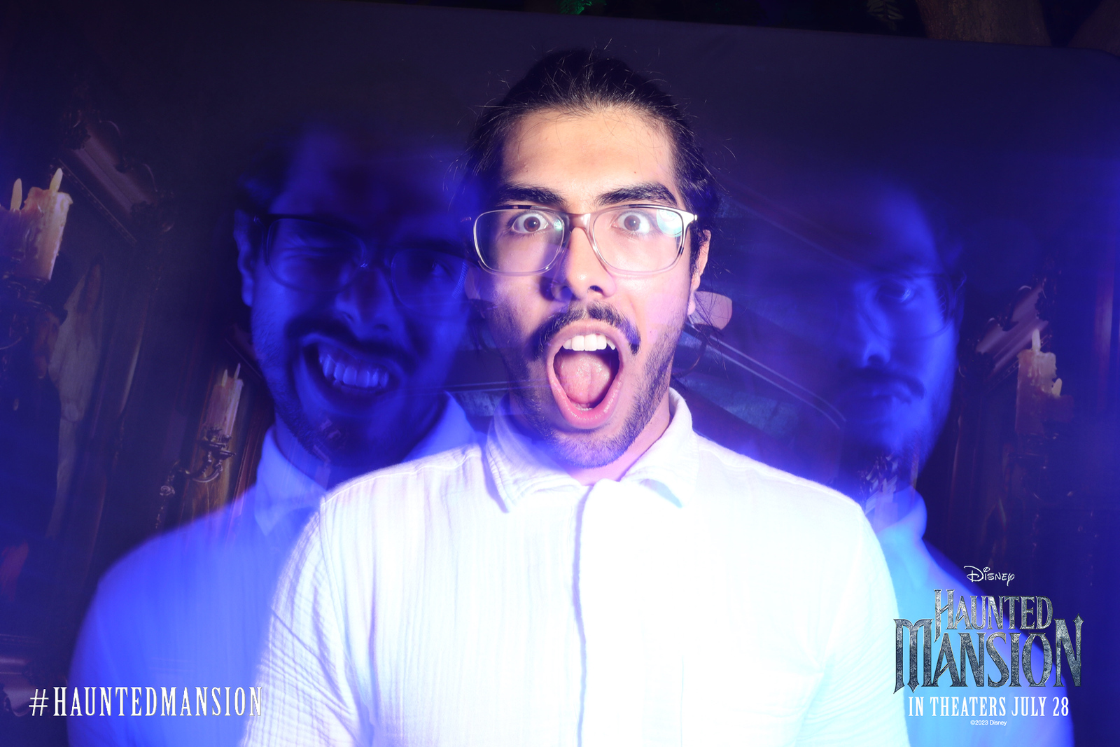 Brand activation with custom photo booth and branded environment at corporate event