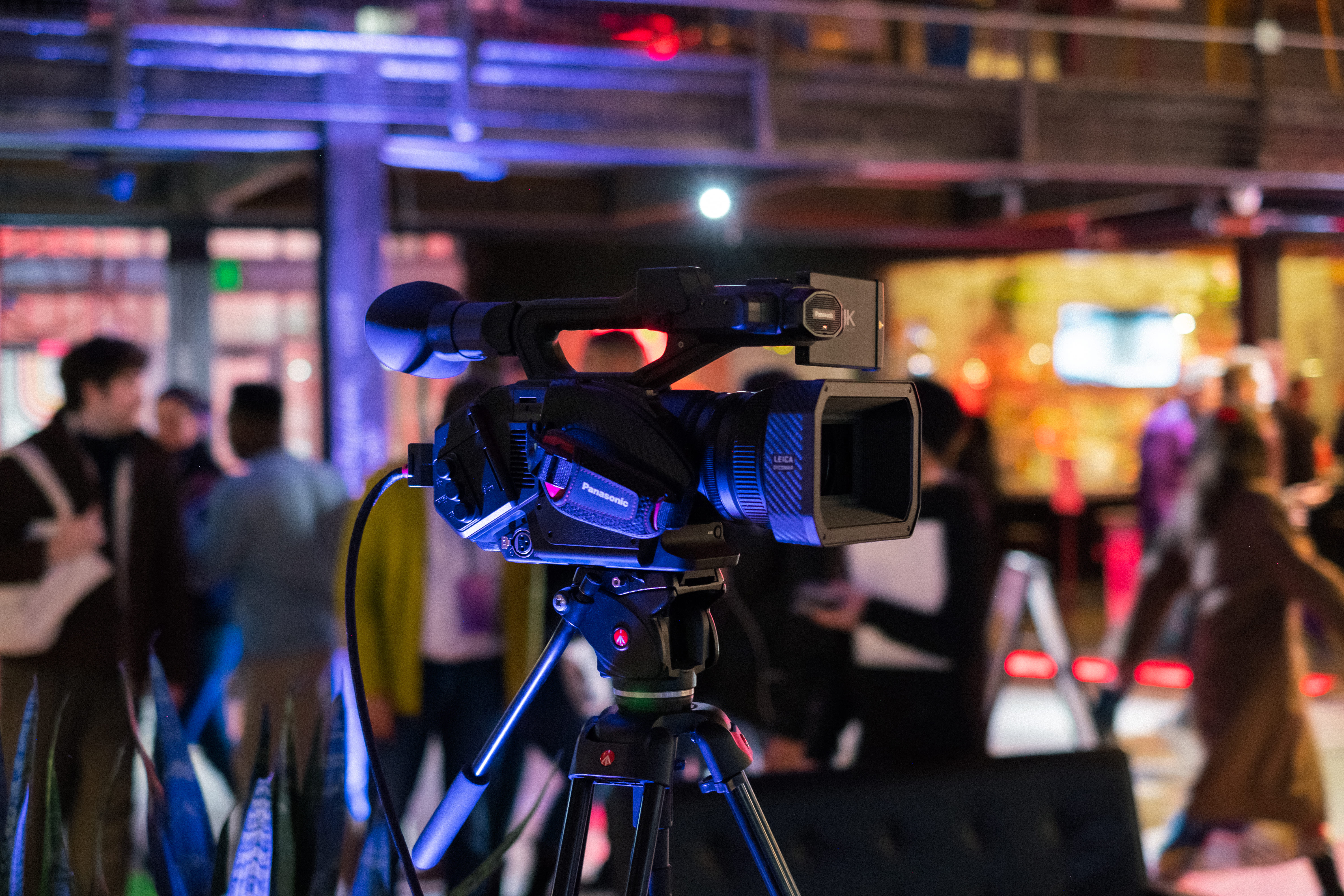 Corporate event setup with modern lighting and staging