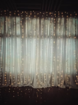 Pipe and drape event decor creating customized spaces and backdrops for celebrations