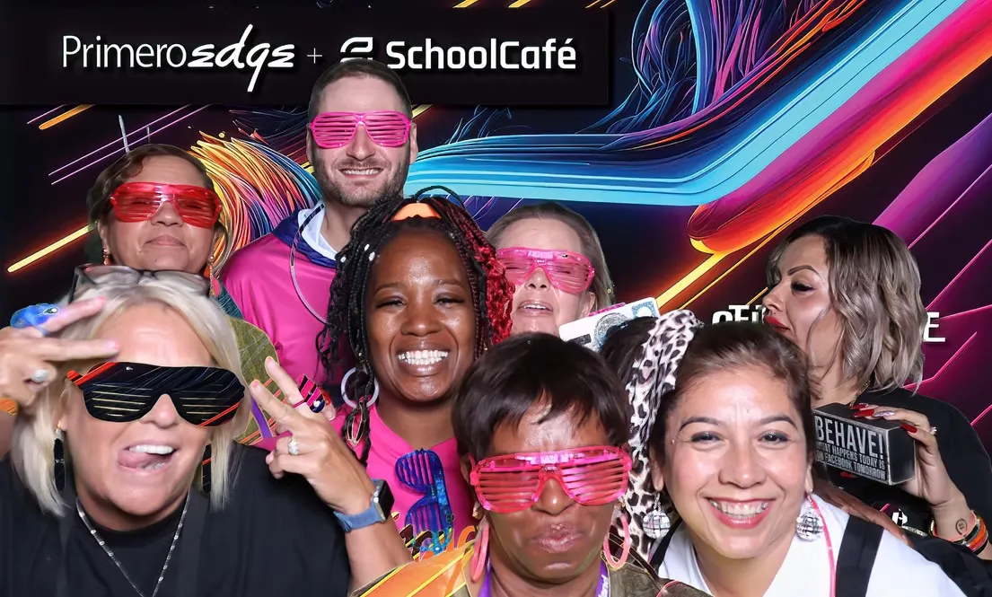 VIP red carpet couple posing with branded step and repeat green screen photo booth