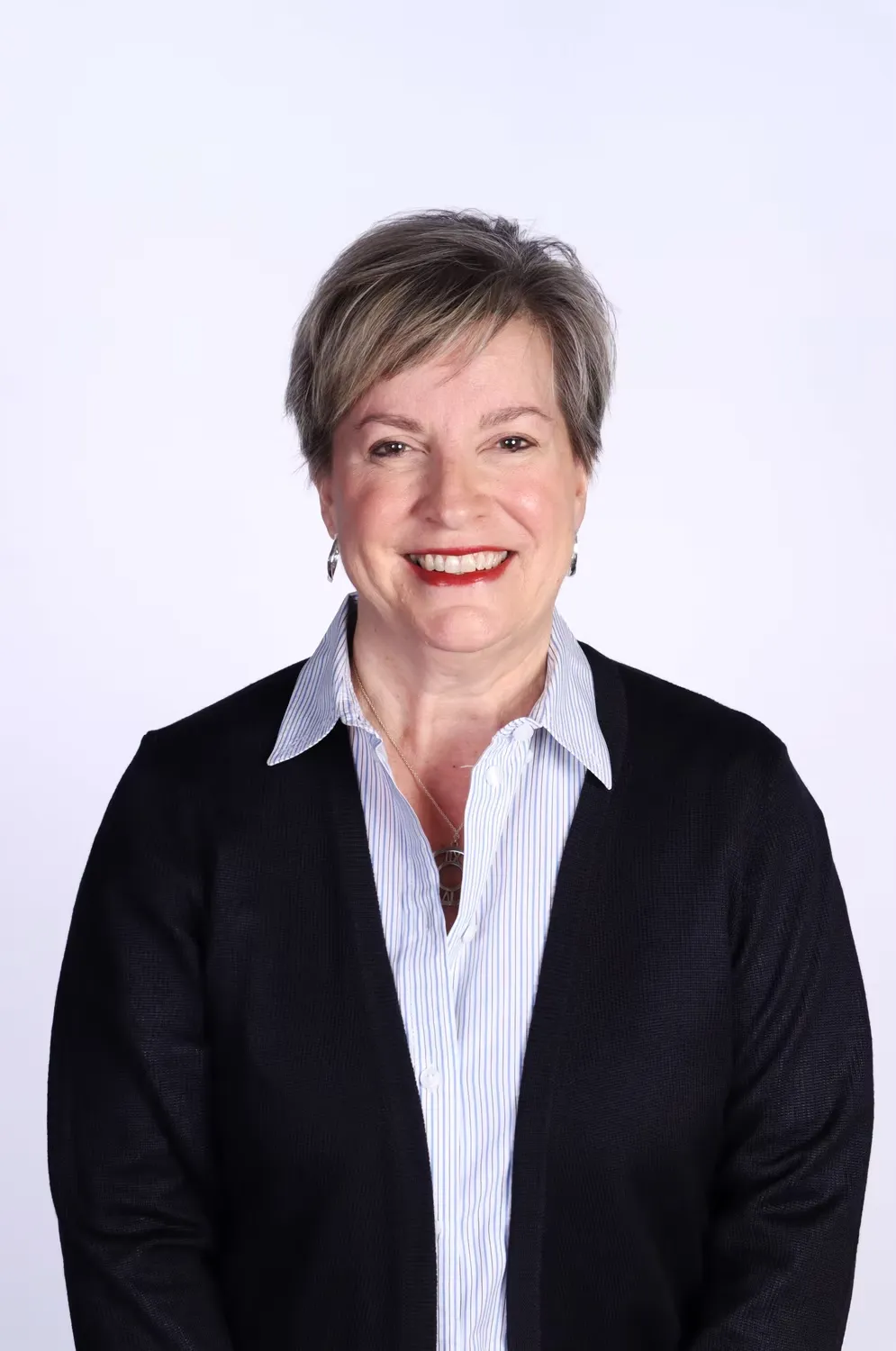 Professional corporate headshot with studio-quality lighting