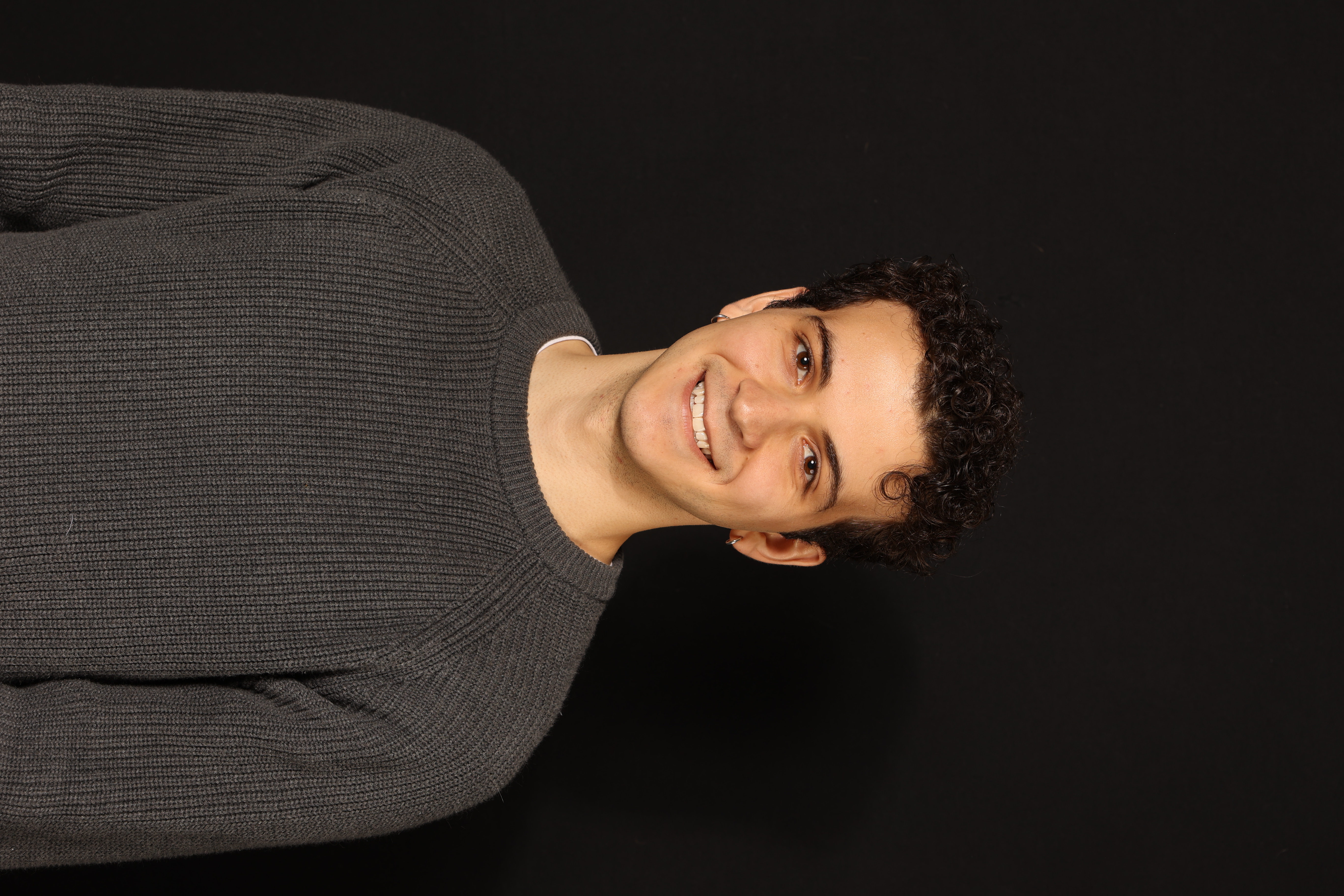 Professional headshot technical setup with lighting equipment and backdrop configuration