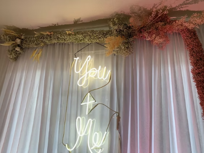 Elegant chandeliers and uplighting transforming a venue for a gala event