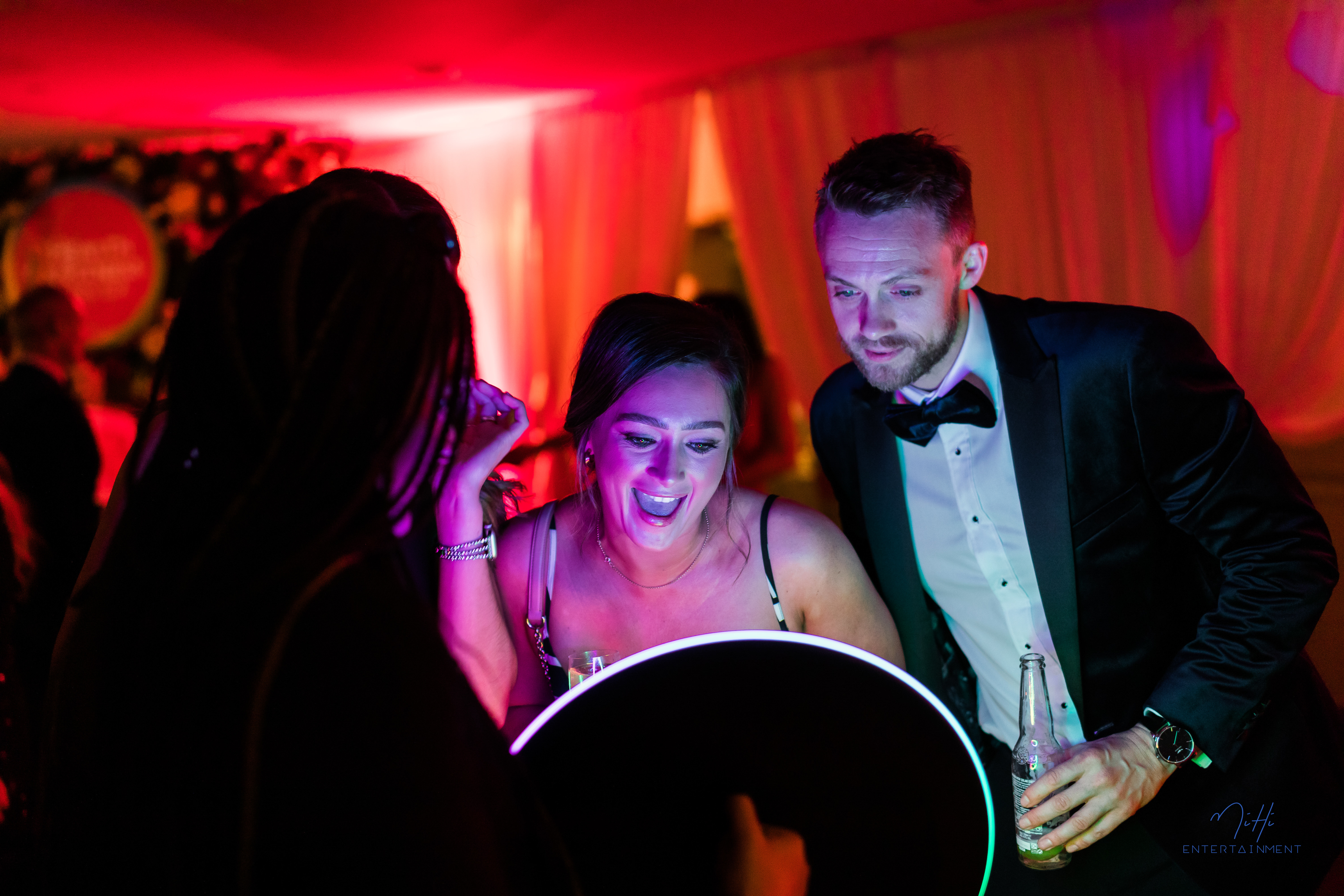 Mobile roaming photographer capturing candid event moments