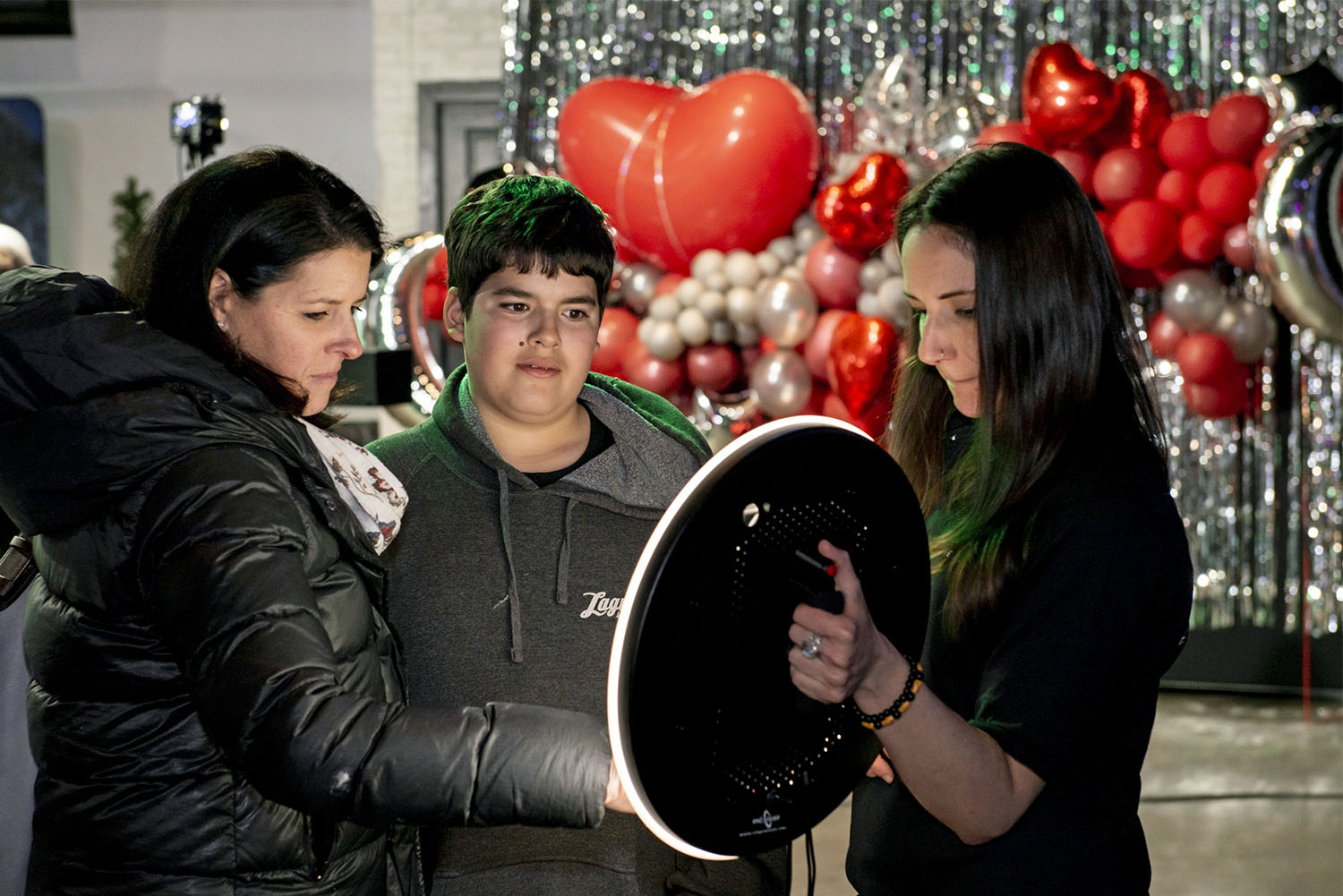 Mobile photographer with DSLR camera capturing event photos