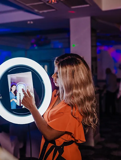Roaming photo booth service with instant sharing at celebration
