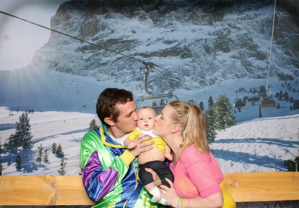 Mountain-themed photo booth with authentic ski lift design perfect for winter weddings and parties