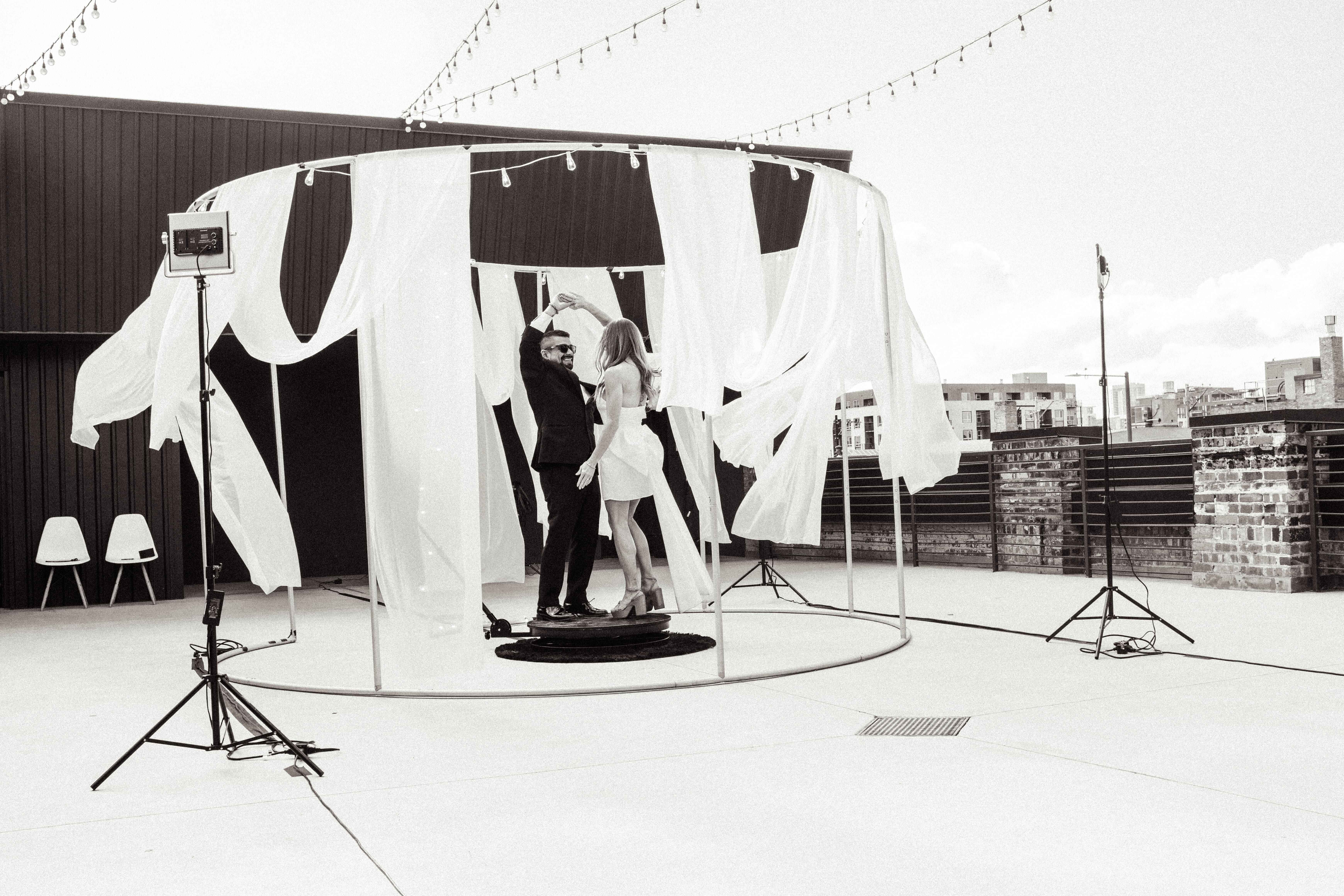 B&W Luxe 360 wedding photography booth for modern weddings